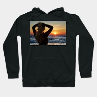 Beautiful woman on the beach at sunrise Hoodie